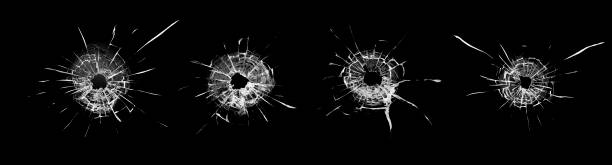 Bullet holes in the glass, collage or set. holes from bullets in the glass, a set of collage or set. sabotage stock pictures, royalty-free photos & images