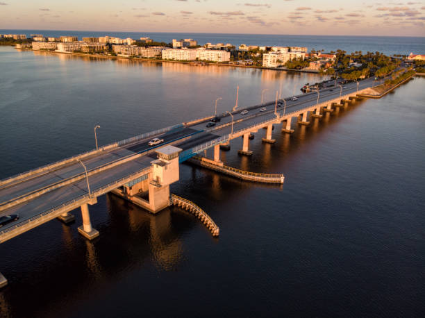 istock Drone point of view of Sunset on a Bridge 1313559612