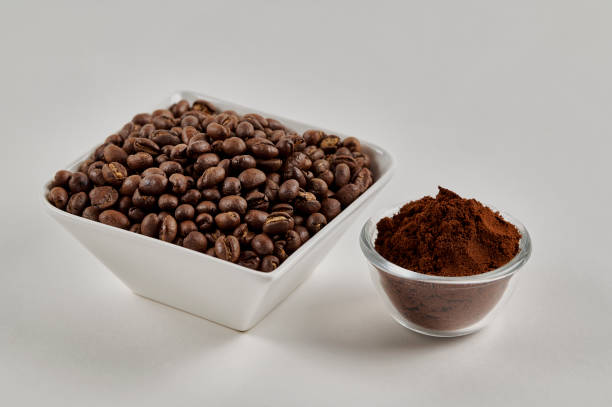 istock Roasted Coffee beans and ground coffee powder 1313559779