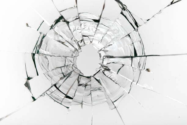 istock Cracks on the glass on a white background. 1313560650