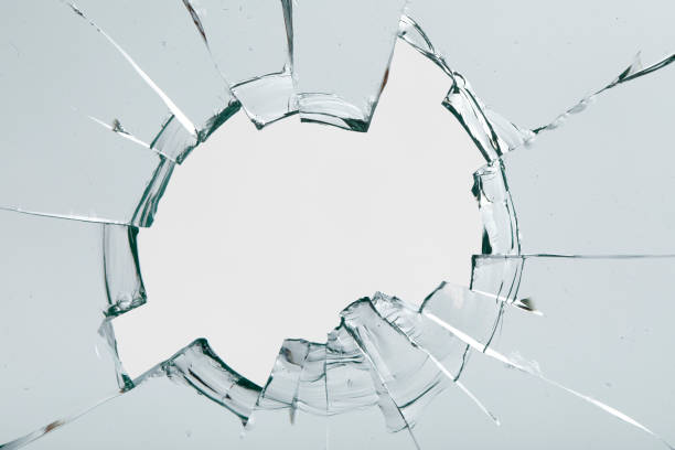 istock Cracks on the glass on a white background. 1313560673