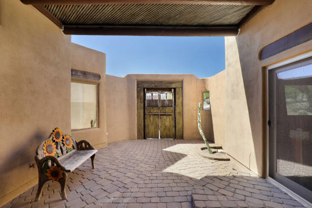 istock Courtyard with adobe walls 1313562355