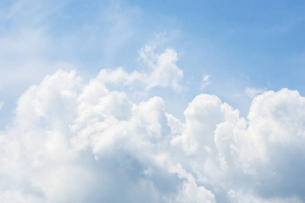 istock Blue sky and beautiful white clouds for background uses. Amazing. Background and wallpaper. 1313568277