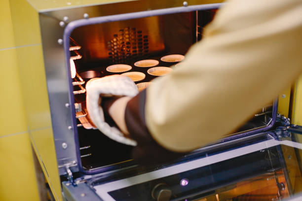 istock Woman bakes desserts in kitchen 1313569906