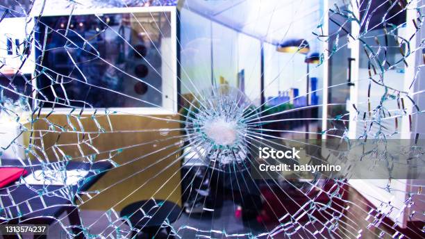 Bulletproof Glass For Home And Office Wall Bullet Resistant Glass House Material For Safety And Protection Anti Thief Resistant To Penetration Curtain Wall Concept Image For Crime Investigation Stock Photo - Download Image Now