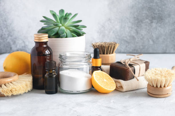 istock Wooden bamboo brushes, baking soda, lemon, essential oils, vinegar. Zero waste eco friendly cleaning concept 1313580564