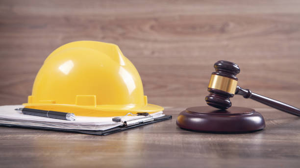 istock Judge gavel and safety helmet. Construction Law 1313581184
