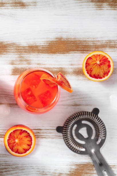 istock Orange cocktail with blood oranges and a strainer, shot from above 1313584908