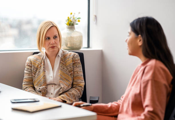 istock Businesswomen Discussing In The Office 1313585255