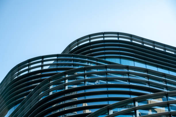 istock edge of modern building exterior with sky. 1313586885