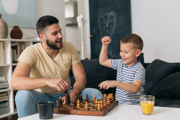istock father and son at home 1313587261