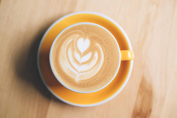 istock Fresh flavored coffee art is on the wooden table. 1313591294