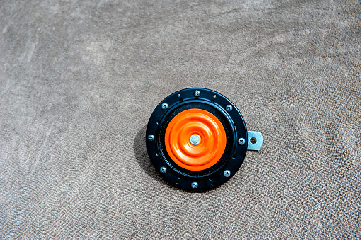 New modern electric orange/black plastic beep - car horn