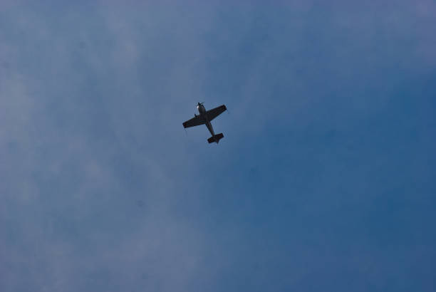 istock Stunt Plane With Blue Skies 1313607237