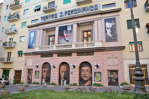 Naples, Campania, Italy - April 8, 2021: Eighteenth-century theater characterized by the portraits of Eduardo De Filippo made by the artist Jorit Agoch in 2014 on the occasion of the Universal Forum of Cultures