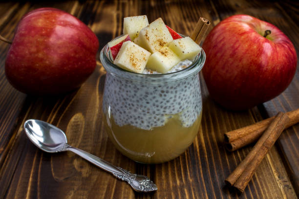 istock Pudding with chia seed, apples and cinnamon  on the brown wooden background 1313608595