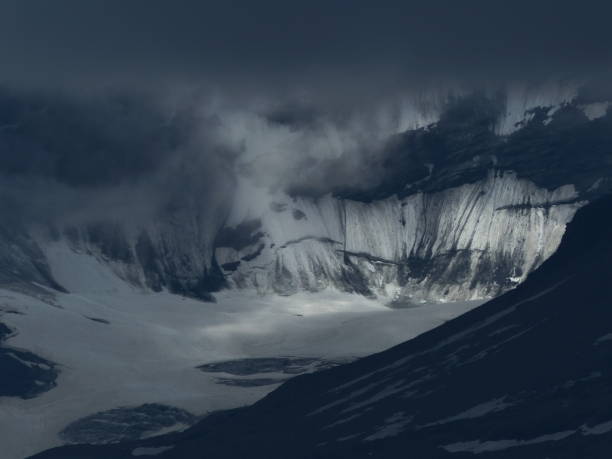 istock Snow-capped mountain and dark clouds, Switzerland 1313610508