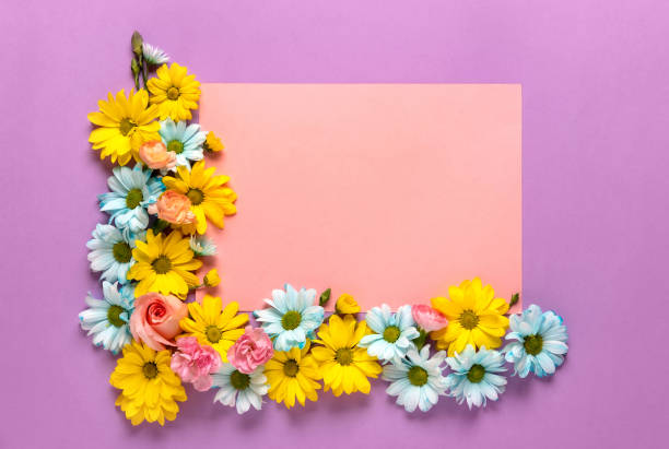 istock Floral wreath on pink background. For spring greeting cards with copy space. Springtime. Flat lay, top view. 1313610793