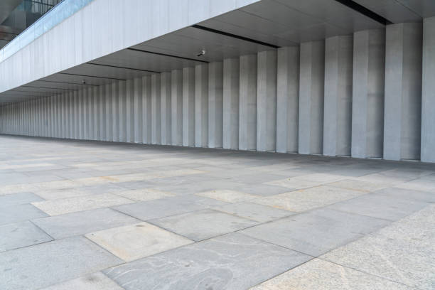 istock empty concrete ground in street and building exterior 1313612229