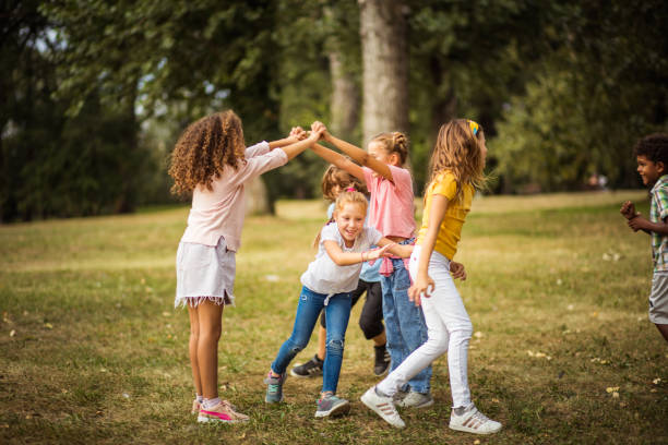 istock Happy kids in schoolyard. 1313613084