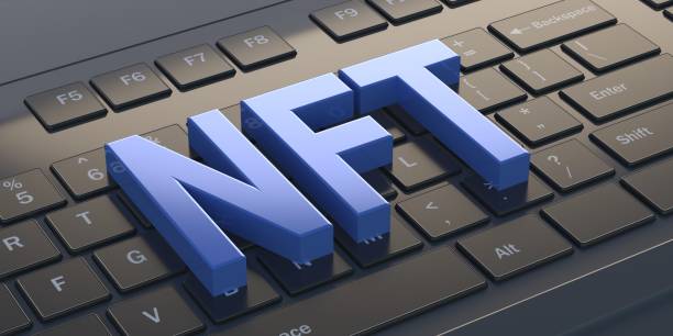 istock NFT Non Fungible Token text on laptop background. 3d illustration 1313613381
