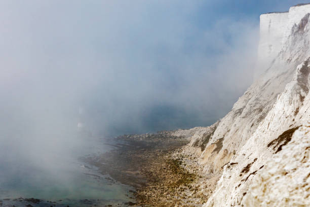 Beachy Head Lighthouse viewed from the chalk headlands in East Sussex, England called Beachy Head.