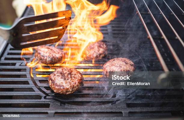 Hamburgers Cooking On The Bbq Stock Photo - Download Image Now - Barbecue Grill, Barbecue - Meal, Grilled