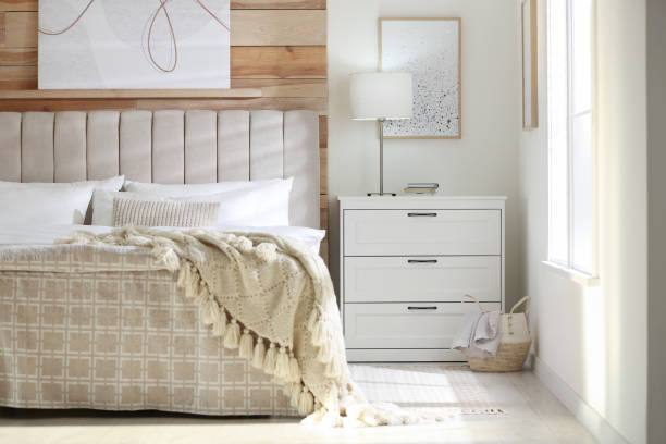 istock Stylish room interior with large comfortable bed 1313616947