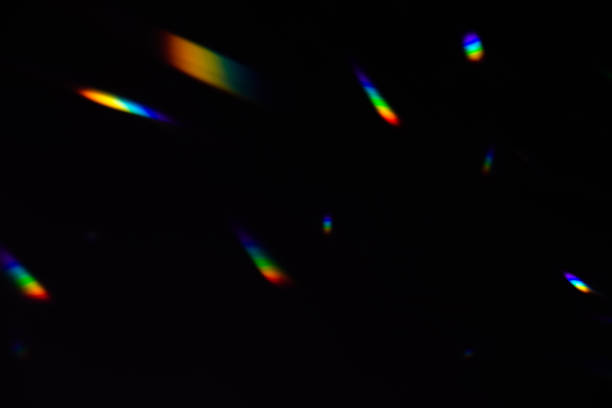 istock colorful warm rainbow crystal light leaks on black background 1313618758