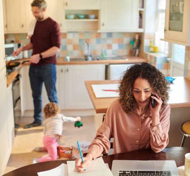 istock working from home with a young family 1313619024
