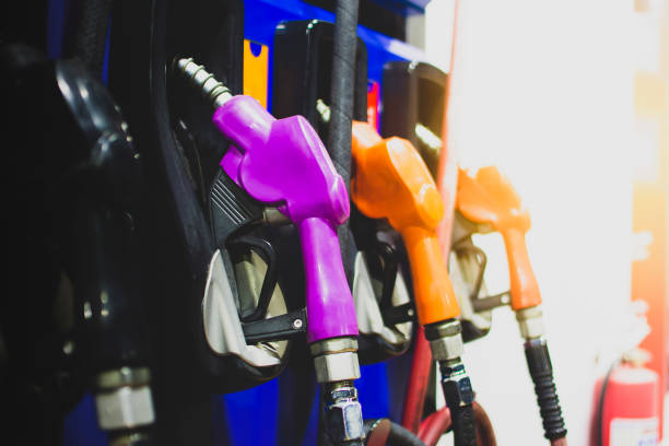 istock Oil nozzle pump in petrol service station 1313622018