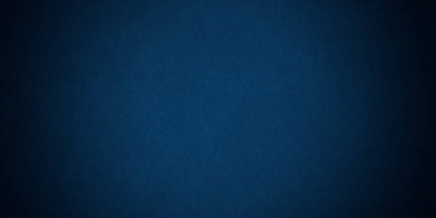 istock Texture of old navy grunge blue paper closeup background 1313624764