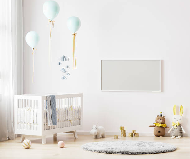 istock Blank horizontal frame mock up on white wall in nursery room interior background with baby bedding, soft toys, balloons, 3d rendering 1313628239