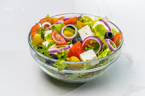 Close-up of fruit and vegetable salad served in bowl.