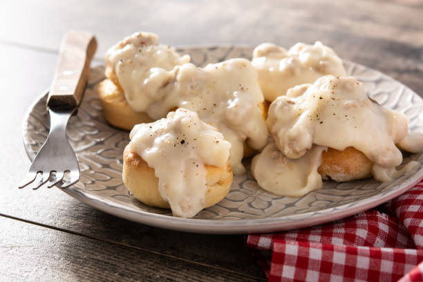 istock Traditional American biscuits and gravy for breakfast 1313631845
