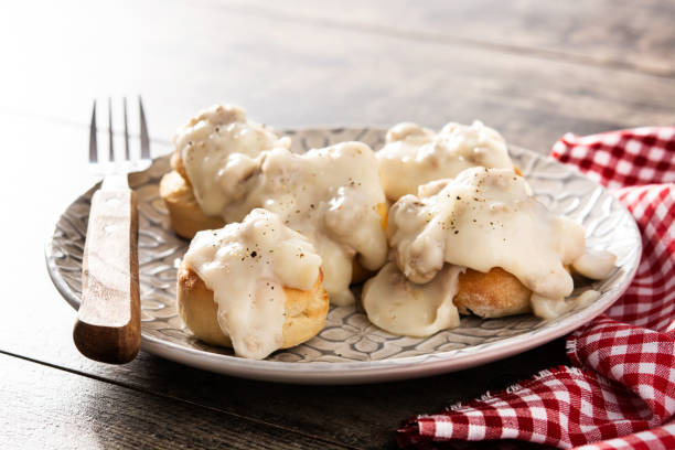 istock Traditional American biscuits and gravy for breakfast 1313631872