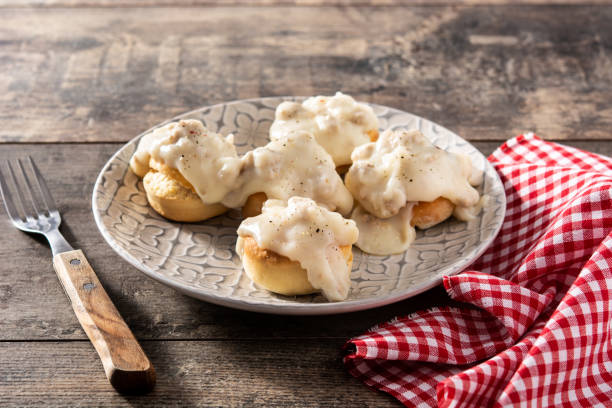 istock Traditional American biscuits and gravy for breakfast 1313631879