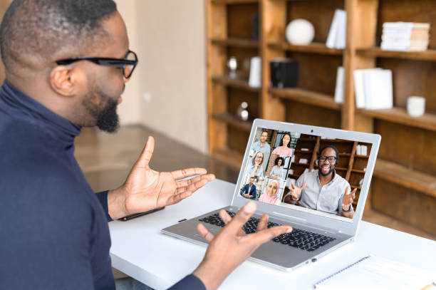 istock Male businessman leads distant communication with colleagues 1313632010