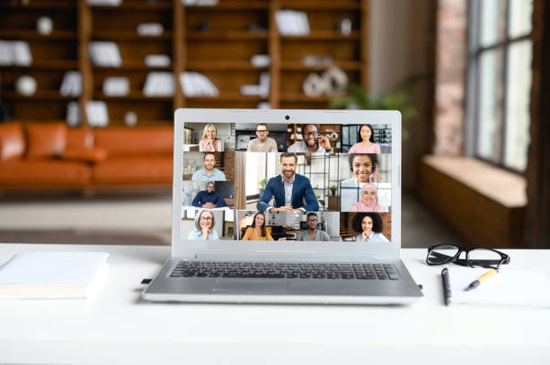 istock Colleagues having a work meeting through a video call 1313632121