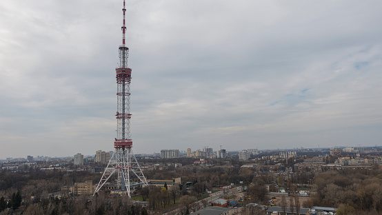 Kiev TV tower against a cloudy sky.