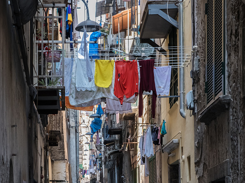 Narrow city street and drying clothes, Naples.