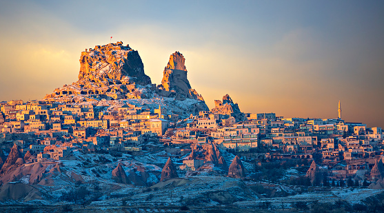 Uchisar town located around tall volcanic rock formations, Cappadocia, Turkey