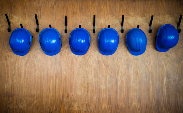 istock Set of protective helmets hanging on the hanger 1313635486