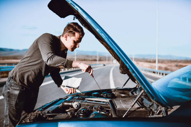 istock Car Oil Check On The Road After Problems 1313635500