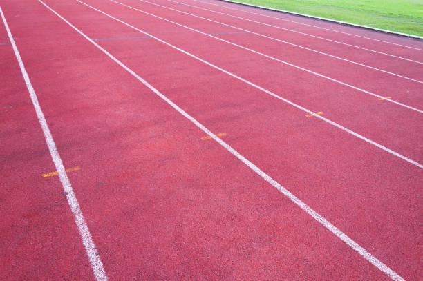 istock running track and green grass 1313636185