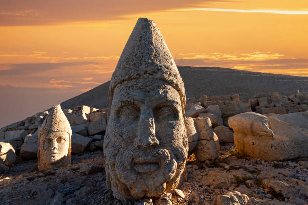 Nemrut Mountain in Adiyaman, Turkey Nemrut Mountain and giant statue heads from1st century BC, in Adiyaman, Turkey. nemrut dagi stock pictures, royalty-free photos & images
