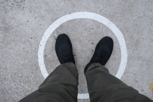 istock A man with black shoe and white line 1313639614