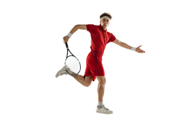 istock One Caucasian man, professional tennis player isolated on white background. 1313640047
