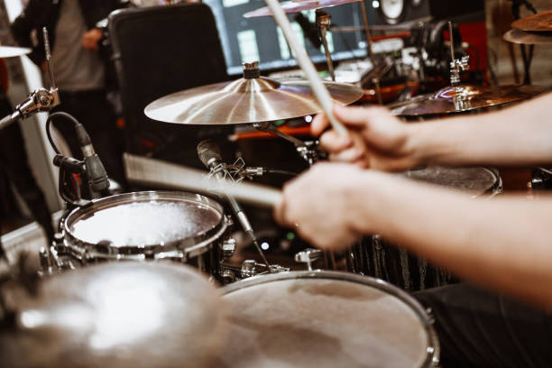 istock Modern Drummer Recording Song In Studio 1313643073