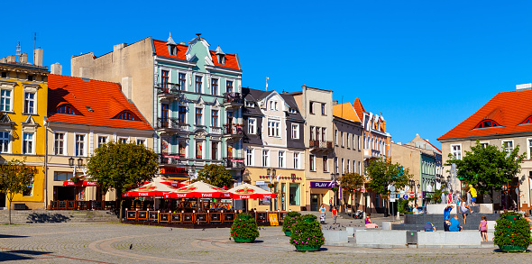 Gniezno, Poland - July 1, 2015: Panoramic view of old town historic city center with Rynek Market Square and colorful tenement houses in Gniezno in Grater Poland region